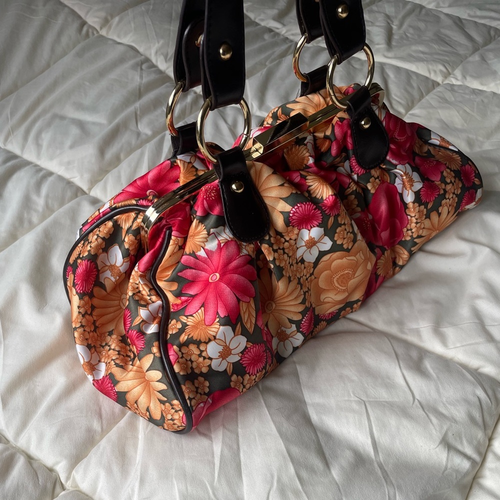 ALDO small floral hand bag with brown leather straps and gold rim